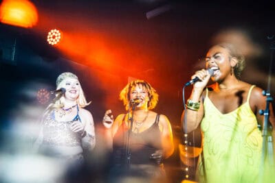 Vocalists performing live.